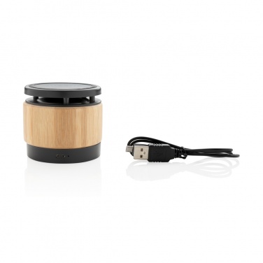 Logotrade Firmengeschenke das Foto: Bambus Wireless Charger und Lautsprecher