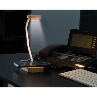 Logotrade ärikingid pilt: Juhtmeta laadijaga laualampTomsk